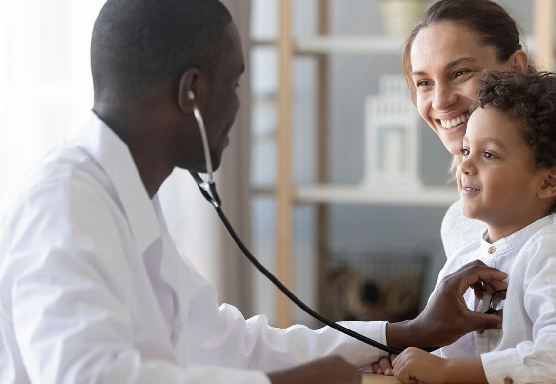 Doctor listening to a child's heart